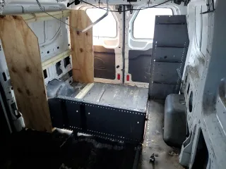 2015 Ford Transit Cargo с VIN 1FTYE1ZMXFKA21435, выставлен на аукционе Copart как лот 61276755 с пробегом 184 249 миль миль и Чистый • Clean title. История ставок и продаж доступна на DreamBid. Изображение 10.