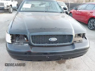 2001 Ford Crown Victoria Police Police Interceptor with VIN 2FAFP71W91X190763, listed as a IAAI auction lot 41781221 with 181,087 mi miles. Bid and sale history available at carsss.com. Image 6.