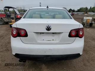 2009 Volkswagen Jetta SE с VIN 3VWRM71K59M060576, выставлен на аукционе Copart как лот 54835895 с пробегом 115 157 миль миль и Списание • Salvage title. История ставок и продаж доступна на DreamBid. Изображение 6.