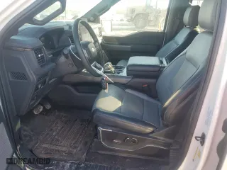 2023 Ford F-150 Lightning Pro with VIN 1FTVW1EV5PWG43000, listed as a Copart auction lot 42684545 with 16,646 mi miles and Salvage Title. Bid and sale history available at carsss.com. Image 7.