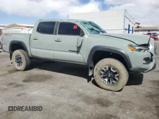 2023 Toyota Tacoma SR with VIN 3TMCZ5AN3PM563612, listed as a Copart auction lot 53995225 with 37,699 mi miles and Salvage title. Bid and sale history available at DreamBid. Image 4.