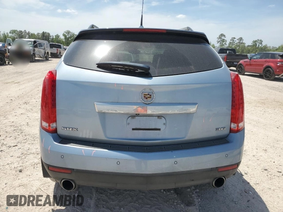 2013 Cadillac SRX Performance Collection with VIN 3GYFNDE37DS535759, listed as a Copart auction lot 52620105 with 92,059 mi miles and Salvage title. Bid and sale history available at DreamBid. Image 6.
