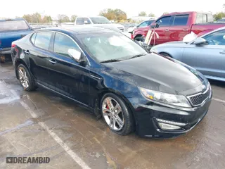 2013 Kia Optima SX w/Limited Pkg with VIN 5XXGR4A6XDG121265, listed as a IAAI auction lot 40771144 with 129,247 mi miles. Bid and sale history available at carsss.com. Image 1.