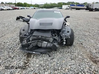 2015 Chevrolet Corvette 2LT z VIN 1G1YC2D72F5106032, wystawiony jako Copart lot #51037405 z przebiegiem 82 421 mil mil oraz Szkoda całkowita • Salvage title. Historia ofert i sprzedaży dostępna na DreamBid. Obrazek 5.