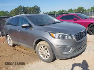 2017 Kia Sorento LX with VIN 5XYPG4A32HG294131, listed as a IAAI auction lot 42079685 with 106,166 mi miles. Bid and sale history available at carsss.com. Image 1.