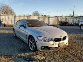 2015 BMW 4 Series 428i z VIN WBA4A5C51FG052009, wystawiony jako Copart lot #89110235 z przebiegiem 156 675 mil mil oraz Szkoda całkowita • Salvage title. Historia ofert i sprzedaży dostępna na DreamBid. Obrazek 10.
