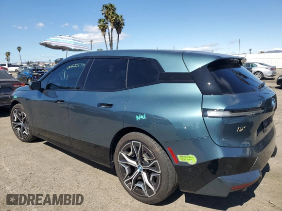 2023 BMW iX M60 with VIN WB533CF01PCM82043, listed as a Copart auction lot 47447815 with 9,058 mi miles and Salvage Title. Bid and sale history available at carsss.com. Image 2.