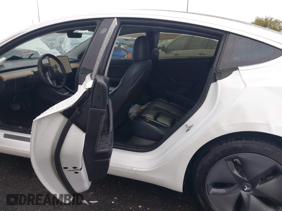 2020 Tesla Model 3 Standard Range Plus with VIN 5YJ3E1EA2LF740225, listed as a IAAI auction lot 41781554 with 46,703 mi miles. Bid and sale history available at carsss.com. Image 8.
