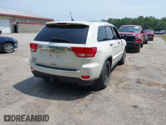 2011 Jeep Grand Cherokee Overland with VIN 1J4RR6GG3BC587857, listed as a IAAI auction lot 42879845 with 165,572 mi miles and . Bid and sale history available at DreamBid. Image 4.