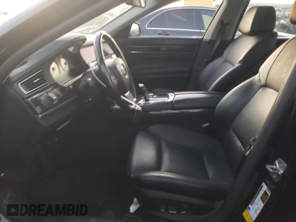 2012 BMW 7 Series with VIN WBAKX8C52CC198431, listed as a Copart auction lot 87894075 with 72,818 mi miles and Clean title. Bid and sale history available at DreamBid. Image 7.