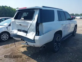 2019 Chevrolet Tahoe LT with VIN 1GNSCBKC2KR128944, listed as a IAAI auction lot 42600686 with 92,980 mi miles and . Bid and sale history available at DreamBid. Image 4.