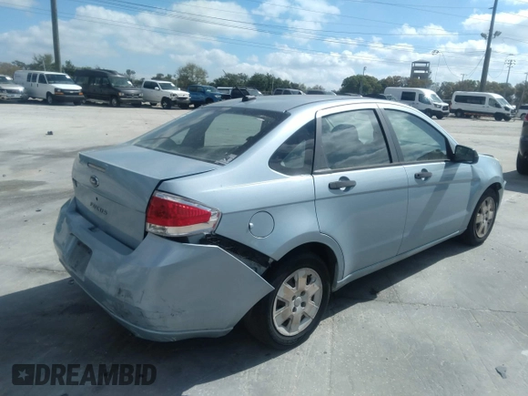 2008 Ford Focus S with VIN 1FAHP34N68W149713, listed as a IAAI auction lot 35985907 with 139,029 mi miles. Bid and sale history available at carsss.com. Image 4.
