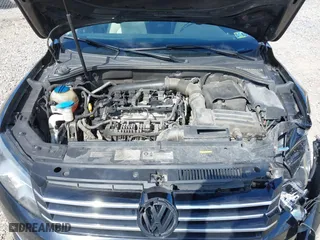 2015 Volkswagen Passat 1.8T Sport with VIN 1VWBT7A35FC062984, listed as a IAAI auction lot 42053939 with 106,095 mi miles. Bid and sale history available at carsss.com. Image 10.