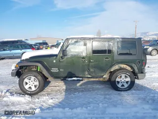 2010 Jeep Wrangler Unlimited Sport with VIN 1J4BA3H12AL127802, listed as a IAAI auction lot 41237029 with 94,320 mi miles. Bid and sale history available at carsss.com. Image 15.