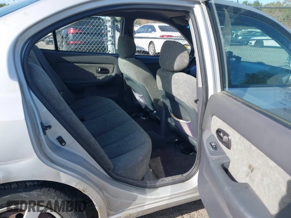 2003 Hyundai Elantra GLS z VIN KMHDN45D23U700908, wystawiony jako IAAI lot #42133529 z przebiegiem 100 955 mil mil oraz . Historia ofert i sprzedaży dostępna na DreamBid. Obrazek 8.