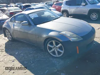 2004 Nissan 350Z Touring z VIN JN1AZ34E94T052428, wystawiony jako IAAI lot #41287749 z przebiegiem 253 293 mil mil oraz . Historia ofert i sprzedaży dostępna na DreamBid. Obrazek 1.