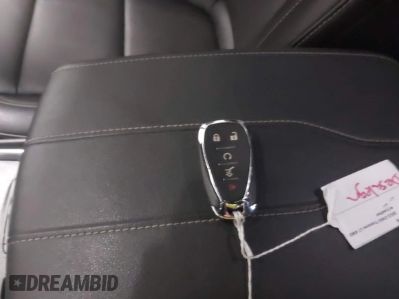 2022 Chevrolet Traverse LT with VIN 1GNEVHKW3NJ124361, listed as a IAAI auction lot 41033053 with 27,869 mi miles and . Bid and sale history available at DreamBid. Image 11.
