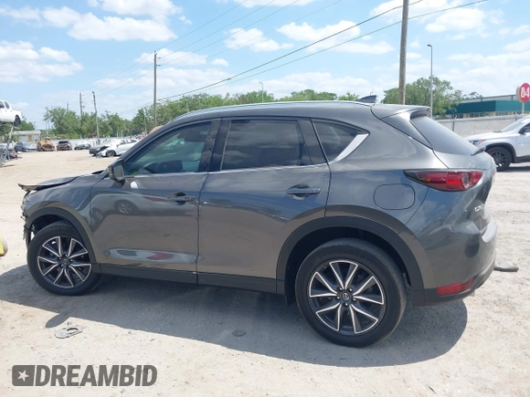 2017 Mazda CX-5 Grand Touring with VIN JM3KFADL3H0227655, listed as a IAAI auction lot 41897981 with 103,545 mi miles. Bid and sale history available at carsss.com. Image 14.