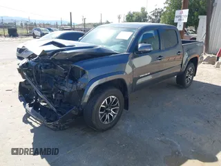 2023 Toyota Tacoma 4WD SR with VIN 3TMCZ5AN1PM600236, listed as a IAAI auction lot 41603152 with 35,956 mi miles. Bid and sale history available at carsss.com. Image 2.