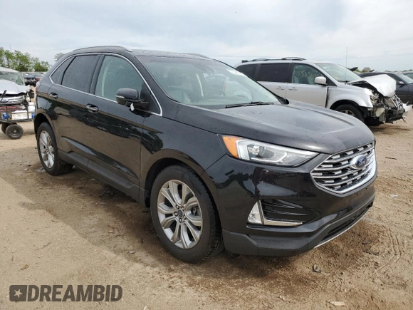 2019 Ford Edge Titanium with VIN 2FMPK4K93KBB42822, listed as a Copart auction lot 57308545 with 102,252 mi miles and Salvage title. Bid and sale history available at DreamBid. Image 4.