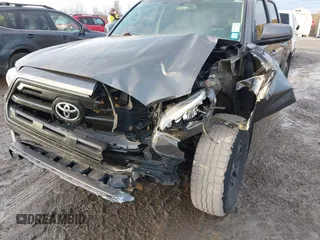 2016 Toyota Tacoma SR5 with VIN 5TFAX5GN1GX056450, listed as a IAAI auction lot 41215339 with 129,604 mi miles. Bid and sale history available at carsss.com. Image 6.