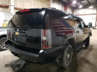 2013 Chevrolet Suburban with VIN 1GNWK5EG4DR246825, listed as a Copart auction lot 56764205 with 162,459 mi miles and Salvage title. Bid and sale history available at DreamBid. Image 3.