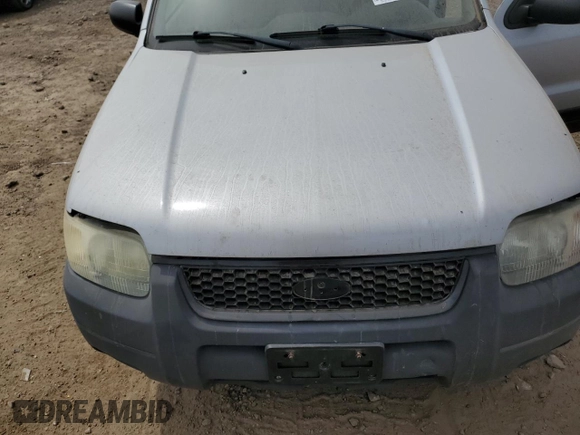 2004 Ford Escape XLS с VIN 1FMYU02134KA88982, выставлен на аукционе Copart как лот 57037915 с пробегом 195 423 миль миль и Списание • Salvage title. История ставок и продаж доступна на DreamBid. Изображение 12.