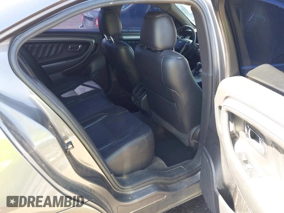 2013 Ford Taurus SEL with VIN 1FAHP2E81DG113242, listed as a IAAI auction lot 41952486 with 169,369 mi miles. Bid and sale history available at carsss.com. Image 8.