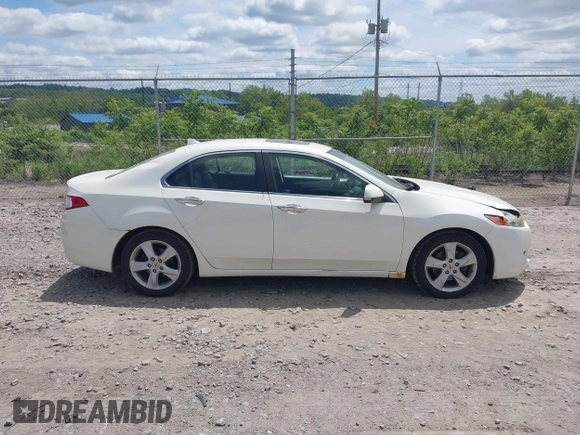 2009 Acura TSX z VIN JH4CU26639C035053, wystawiony jako IAAI lot #42302125 z przebiegiem 125 316 mil mil oraz . Historia ofert i sprzedaży dostępna na DreamBid. Obrazek 13.