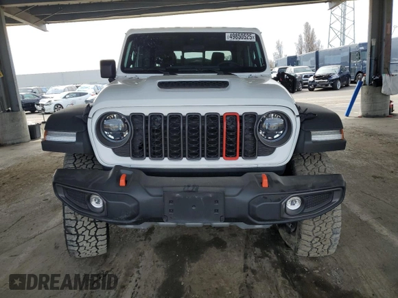 2024 Jeep Gladiator Mojave X с VIN 1C6JJTEGXRL105429, выставлен на аукционе Copart как лот 49850525 с пробегом 4 692 миль миль и Списание • Salvage title. История ставок и продаж доступна на DreamBid. Изображение 5.