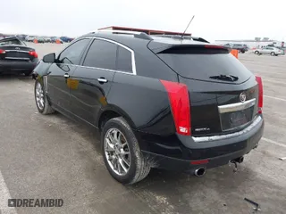 2015 Cadillac SRX Performance Collection with VIN 3GYFNFE35FS546905, listed as a IAAI auction lot 41588405 with 145,620 mi miles. Bid and sale history available at carsss.com. Image 3.