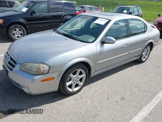 2003 Nissan Maxima SE with VIN JN1DA31D33T513282, listed as a IAAI auction lot 42289710 with 343,973 mi miles and . Bid and sale history available at DreamBid. Image 2.