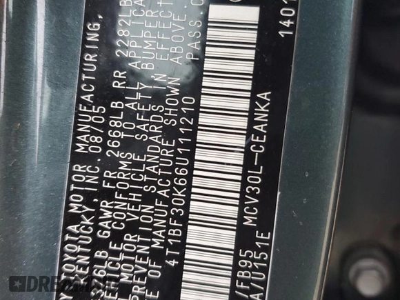 2006 Toyota Camry LE z VIN 4T1BF30K66U111210, wystawiony jako Copart lot #53107095 z przebiegiem 214 638 mil mil oraz Szkoda całkowita • Salvage title. Historia ofert i sprzedaży dostępna na DreamBid. Obrazek 12.