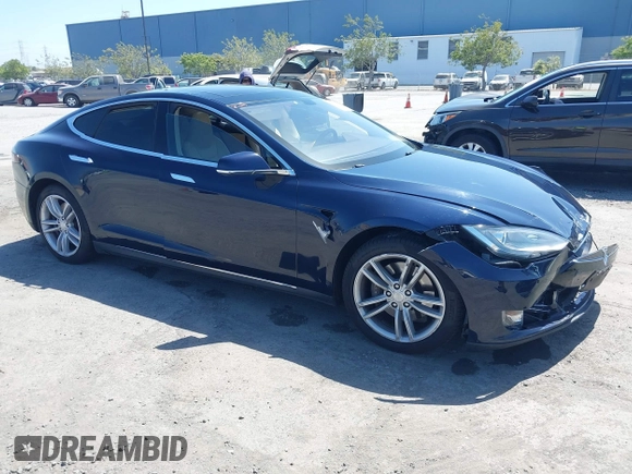 2014 Tesla Model S 60 with VIN 5YJSA1H12EFP46760, listed as a IAAI auction lot 42344596 with 106,252 mi miles and . Bid and sale history available at DreamBid. Image 1.