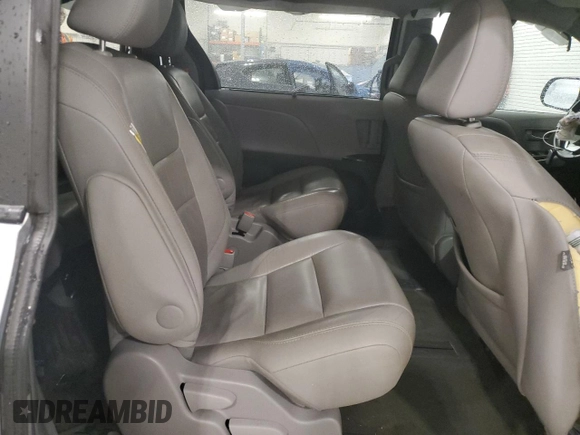 2017 Toyota Sienna XLE with VIN 5TDDZ3DC4HS166141, listed as a Copart auction lot 64357715 with 124,184 mi miles and Salvage title. Bid and sale history available at DreamBid. Image 11.