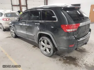 2011 Jeep Grand Cherokee Overland with VIN 1J4RR6GTXBC701186, listed as a IAAI auction lot 41553697 with 172,317 mi miles. Bid and sale history available at carsss.com. Image 3.
