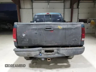 1999 Ford Super Duty F-250 XL with VIN 1FTNF21L9XEA36436, listed as a Copart auction lot 80172084 with 332,835 mi miles and Salvage Title. Bid and sale history available at carsss.com. Image 6.