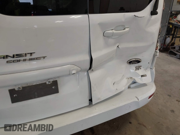 2015 Ford Transit Connect XLT z VIN NM0GS9F71F1194474, wystawiony jako IAAI lot #41666625 z przebiegiem 111 224 mil mil oraz . Historia ofert i sprzedaży dostępna na DreamBid. Obrazek 18.