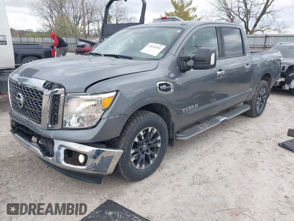 2017 Nissan Titan Platinum Reserve z VIN 1N6AA1E5XHN530256, wystawiony jako IAAI lot #42031654 z przebiegiem 97 200 mil mil oraz . Historia ofert i sprzedaży dostępna na DreamBid. Obrazek 2.