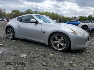 2010 Nissan 370Z with VIN JN1AZ4EH6AM505621, listed as a Copart auction lot 52745505 with 107,660 mi miles and Salvage Title. Bid and sale history available at carsss.com. Image 4.