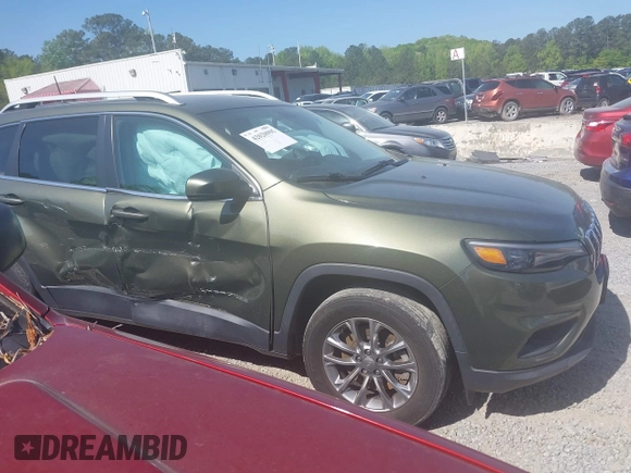 2019 Jeep Cherokee Latitude Plus with VIN 1C4PJMLB4KD418282, listed as a IAAI auction lot 42020995 with 58,000 mi miles and . Bid and sale history available at DreamBid. Image 13.