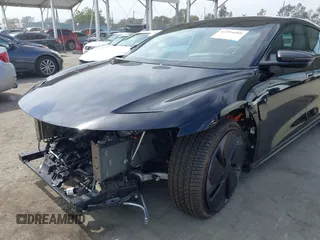 2024 Lucid Air Touring z VIN 50EA1TEAXRA005987, wystawiony jako IAAI lot #42294088 z przebiegiem Nie podano mil oraz . Historia ofert i sprzedaży dostępna na DreamBid. Obrazek 6.