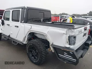 2021 Jeep Gladiator Willys with VIN 1C6HJTAG1ML575474, listed as a IAAI auction lot 41439898 with 44,335 mi miles and . Bid and sale history available at DreamBid. Image 6.