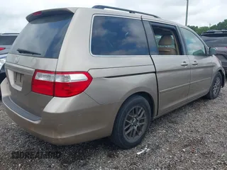 2007 Honda Odyssey EX-L z VIN 5FNRL38717B102646, wystawiony jako IAAI lot #42380196 z przebiegiem 234 088 mil mil oraz . Historia ofert i sprzedaży dostępna na DreamBid. Obrazek 4.