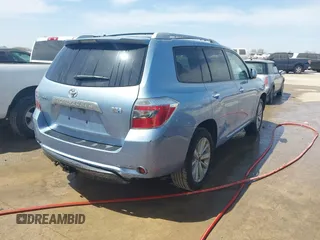 2009 Toyota Highlander Hybrid with VIN JTEEW41AX92033863, listed as a IAAI auction lot 41788531 with 215,787 mi miles. Bid and sale history available at carsss.com. Image 4.