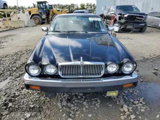1986 Jaguar XJ z VIN SAJAV1341GC458926, wystawiony jako Copart lot #73985024 z przebiegiem 73 337 mil mil oraz Czysty tytuł • Clean title. Historia ofert i sprzedaży dostępna na DreamBid. Obrazek 5.