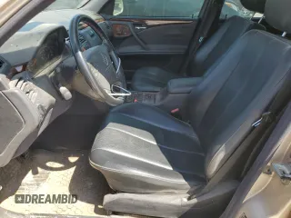 2003 Mercedes-Benz E-Class AWD with VIN WDBJH82J93X088042, listed as a Copart auction lot 70566864 with 167,374 mi miles and Salvage Title. Bid and sale history available at carsss.com. Image 7.