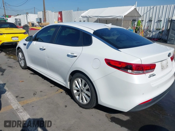 2018 Kia Optima LX with VIN 5XXGT4L30JG258392, listed as a IAAI auction lot 41987874 with 65,616 mi miles and . Bid and sale history available at carsss.com. Image 3.