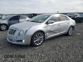 2014 Cadillac XTS Luxury with VIN 2G61M5S31E9199735, listed as a Copart auction lot 48364395 with 99,841 mi miles and Salvage Title. Bid and sale history available at carsss.com. Image 1.
