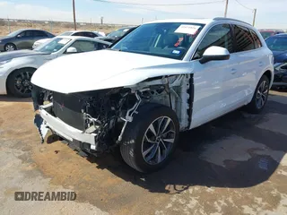 2021 Audi Q5 Premium Plus with VIN WA1BAAFYXM2125942, listed as a IAAI auction lot 41671026 with 63,804 mi miles. Bid and sale history available at carsss.com. Image 2.